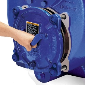Hand operating the removable cover plate of a Gorman-Rupp Super U series pump, showcasing accessibility for maintenance and blockage removal.